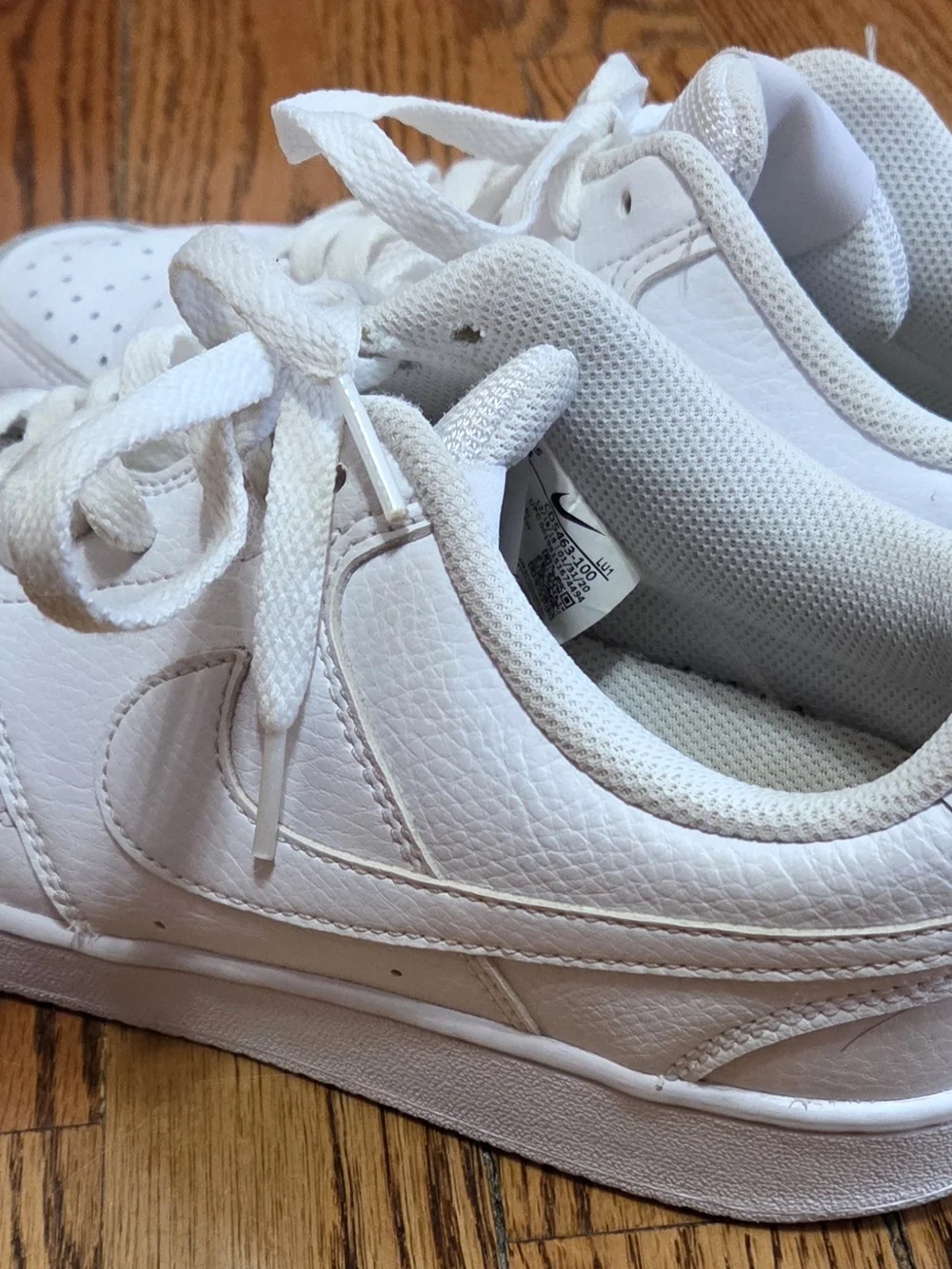 Nike Women’s Classic All-White Leather Court Vision Sneakers